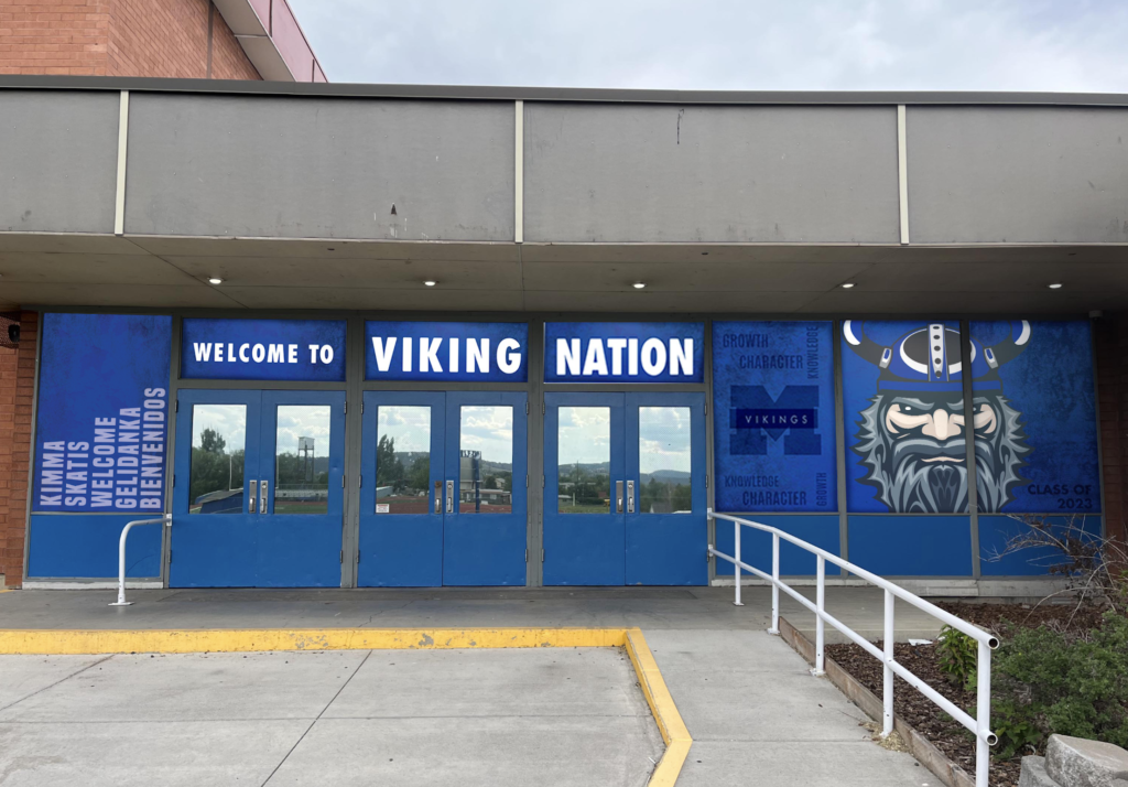 A mock-up of the new “Welcome” sign is displayed at the main office entrance of Mazama High School. (Photo by Ken Smith/KlamathTribes. Image is available for media use.)