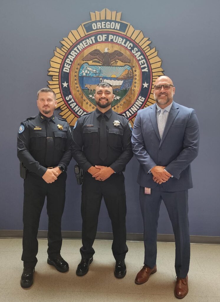 Klamath Tribes Police Chief Jeff Lee, Officer Zak Jackson and Law and Order Commission Chair Ben Klecker at Jackson’s DPSST graduation.